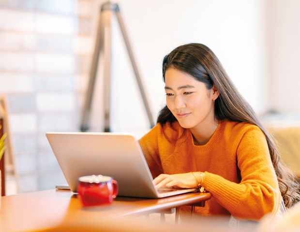 young woman smiling computer_s.jpg