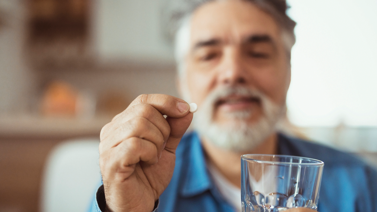 man-taking-aspirin